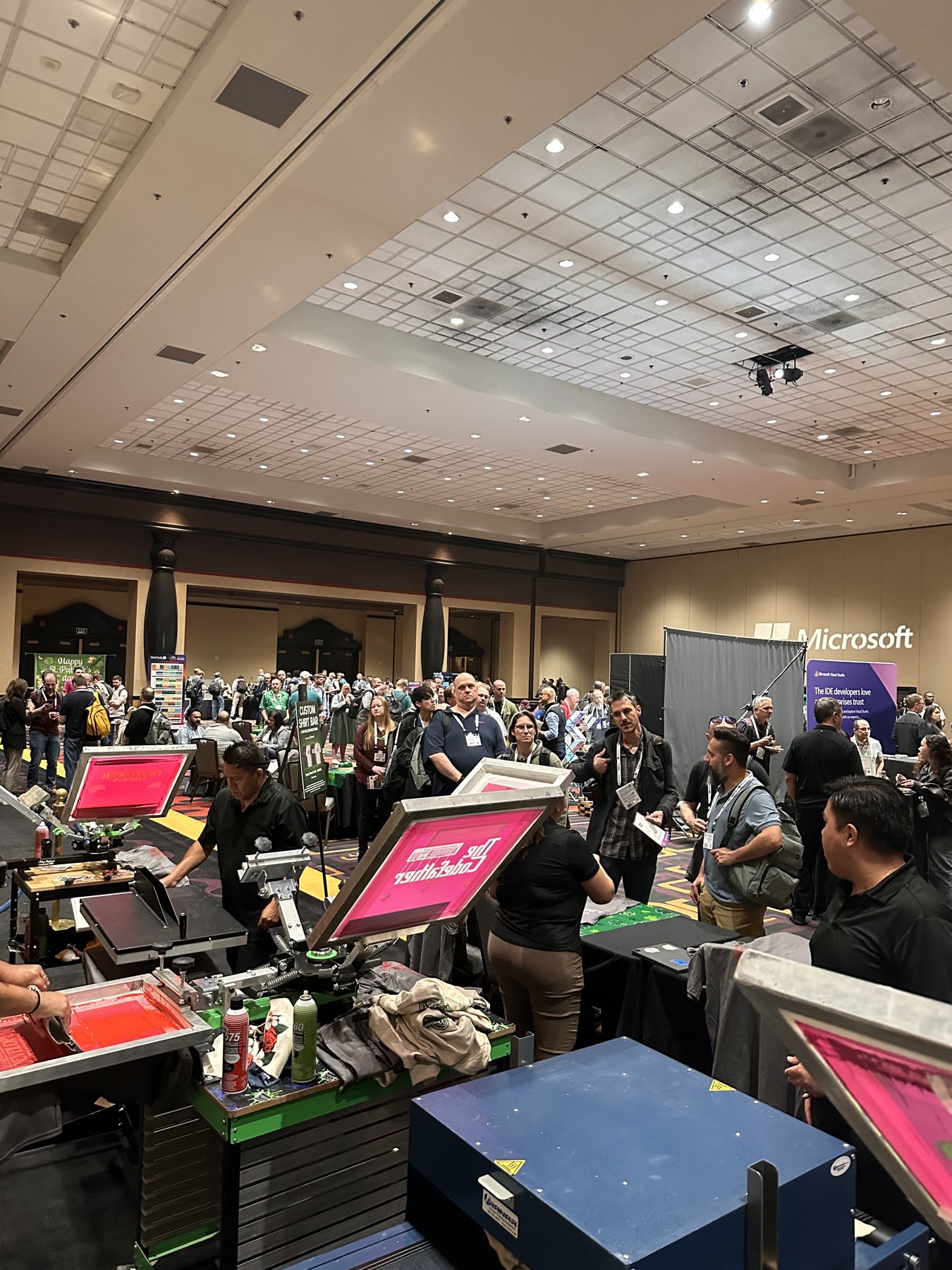 Attendee shirt being printed live at a Las Vegas trade show booth