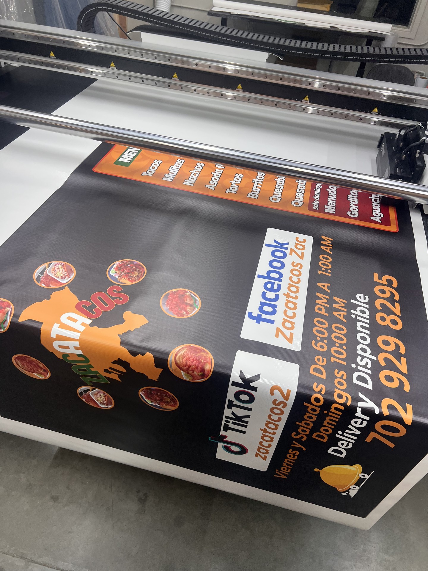 Same-day large-format menu board + exterior signage for quick-serve launch