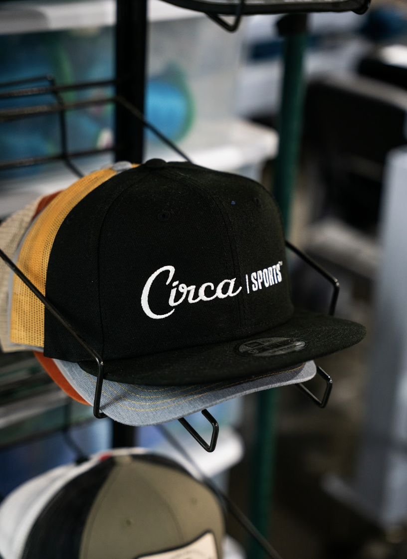 Embroidered New Era snapback caps for sportsbook staff & retail