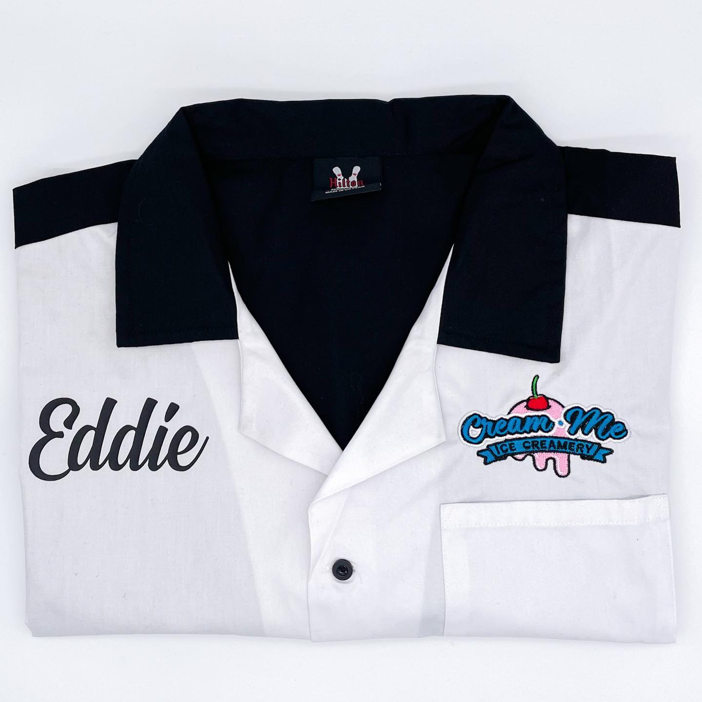 Cream Me Ice Creamery staff bowling shirt - embroidered chest logo and personalized 'Eddie' name script for Las Vegas F&B uniform program