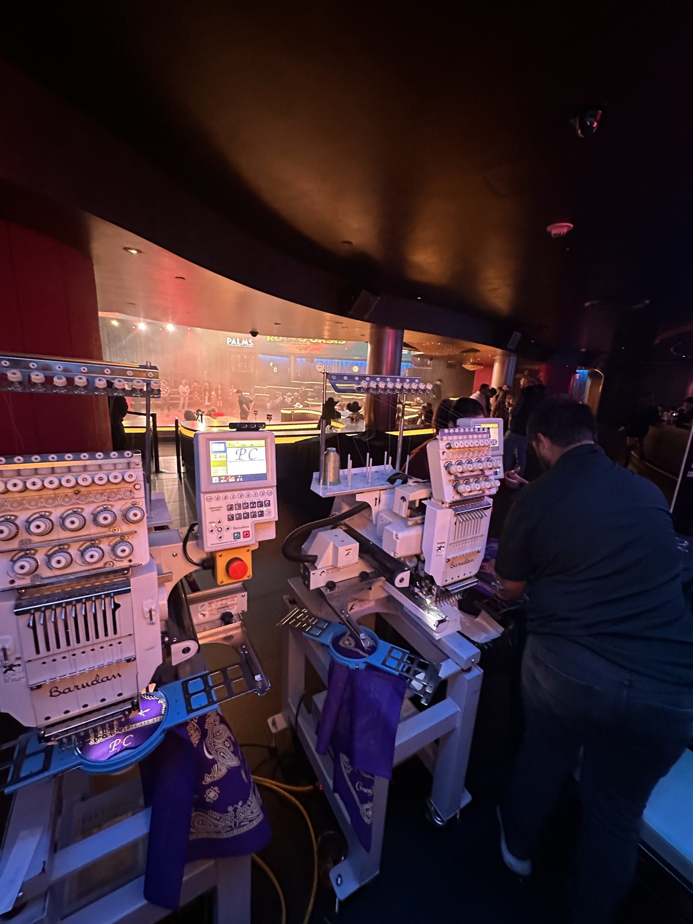 On-site embroidery station personalizing apparel at a Vegas brand activation