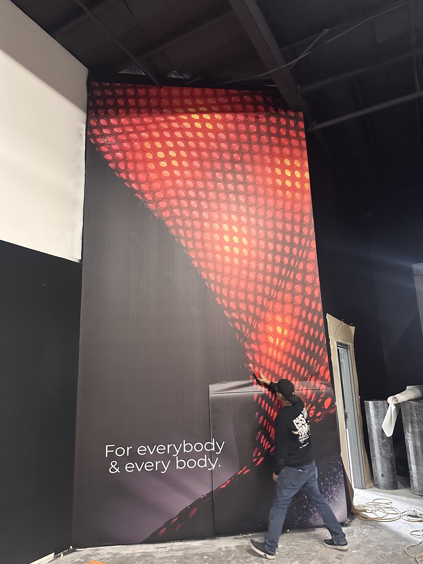 Wide-format event graphic installed on-site at Vegas venue