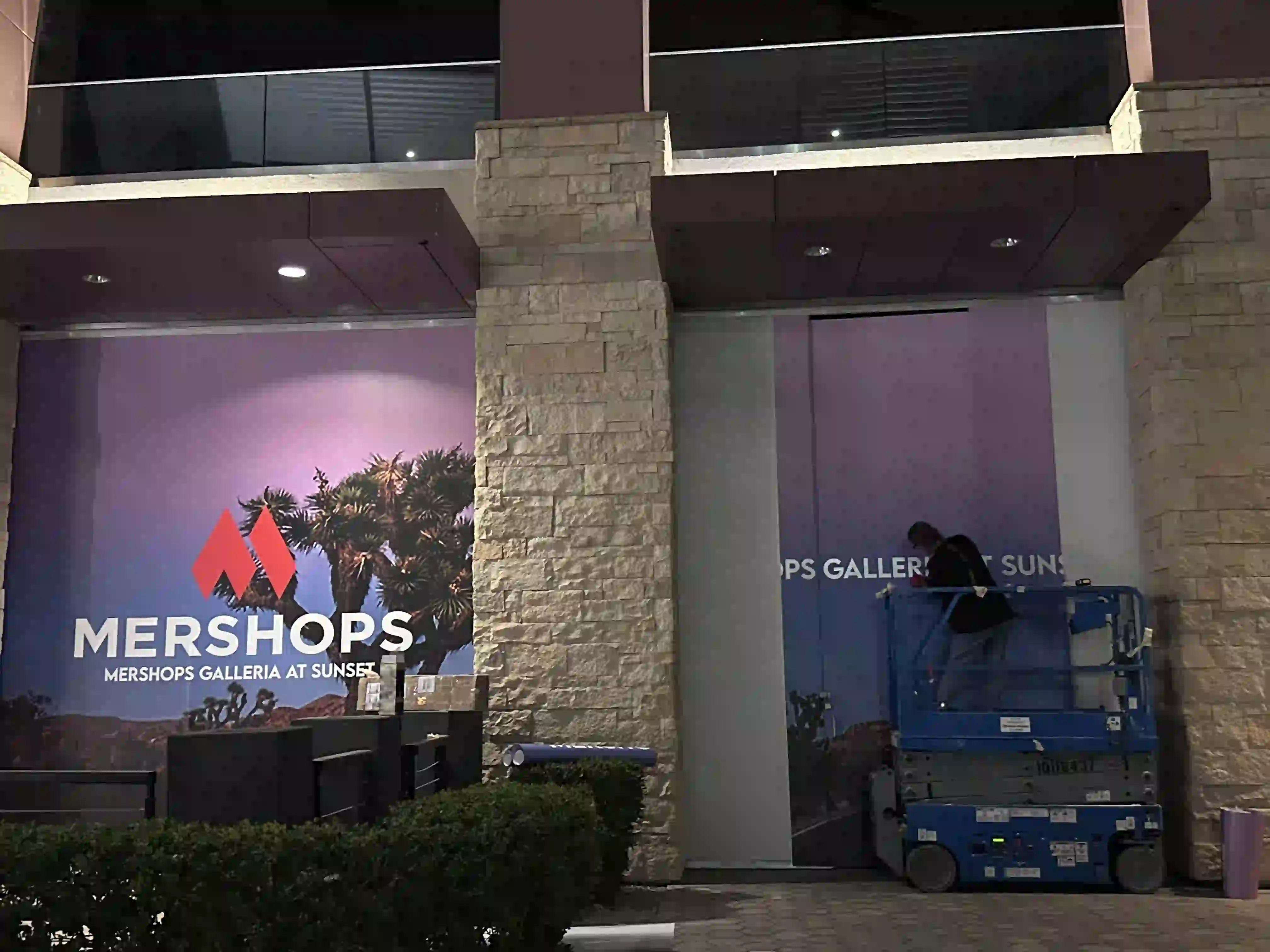 Mershops Galleria at Sunset exterior building wrap installed by Solid Promo Prints