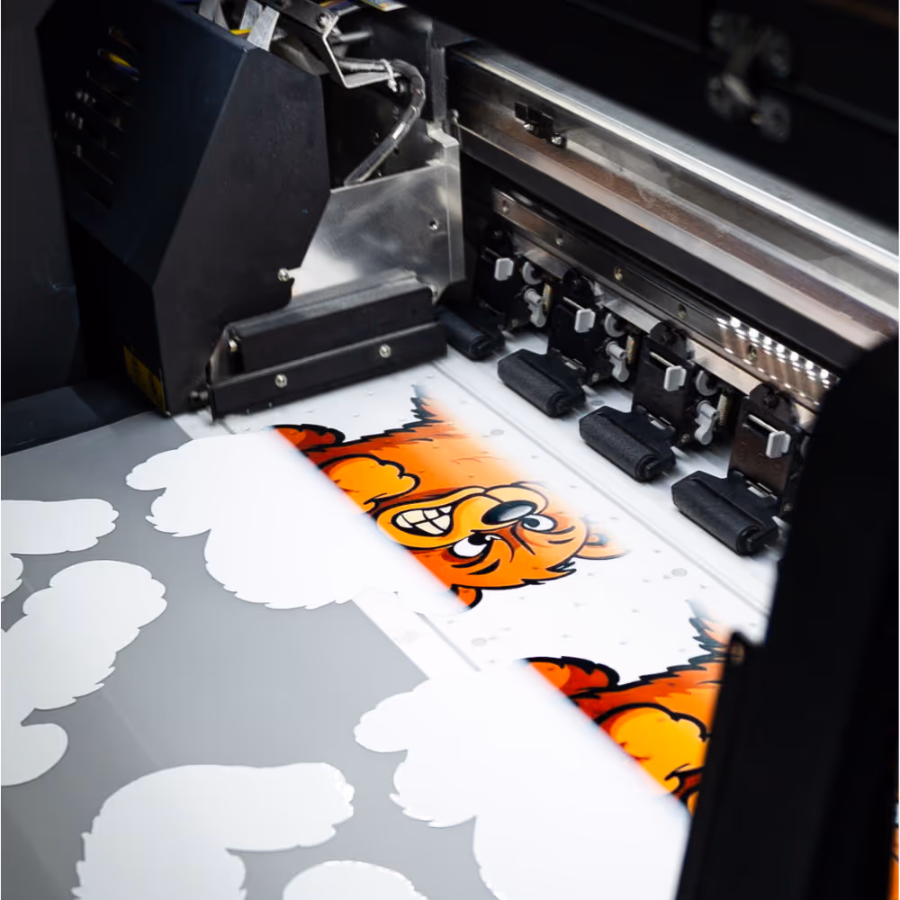 DTF transfer being applied to garment with heat press