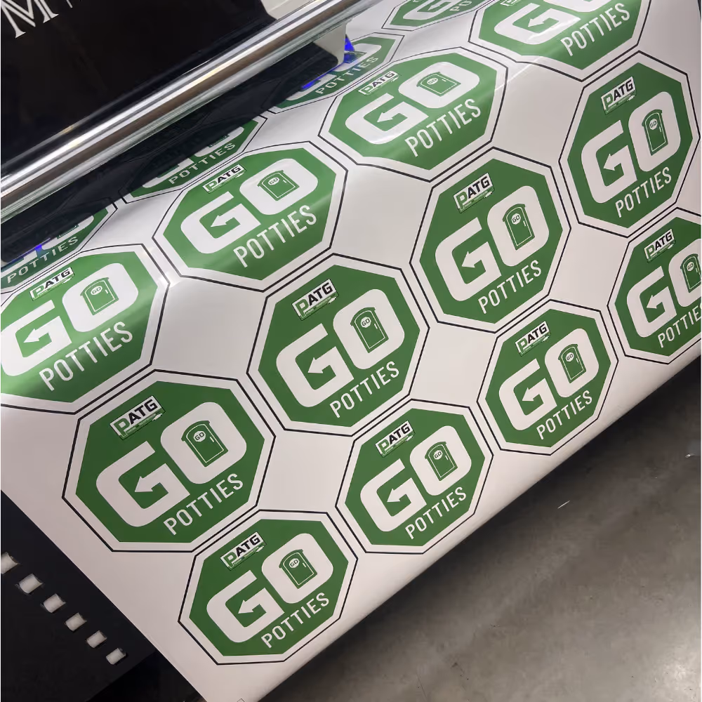 Large format printer producing oversized graphic with deep color saturation